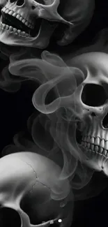 Skulls with swirling smoke in a dark background.