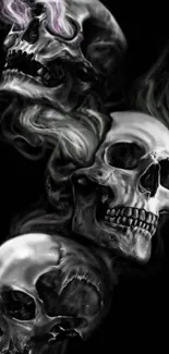 Artistic gothic skulls with smoke on a dark background.