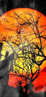 Eerie tree silhouette against orange sunset in spooky mobile wallpaper.