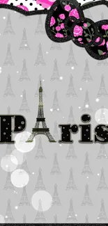 Paris-themed mobile wallpaper with Eiffel Tower and pink floral design.