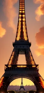 Stunning Eiffel Tower at sunset with vibrant orange skies.