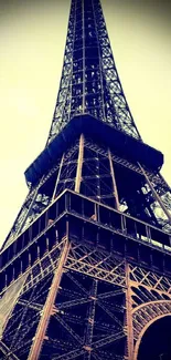 Vintage Eiffel Tower with blue tones in Paris, ideal for mobile wallpaper.