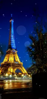 Eiffel Tower illuminated at night against a vibrant blue sky.