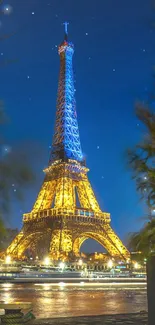 Illuminated Eiffel Tower against a dark blue night sky, Paris wallpaper.