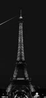 Elegant black and white Eiffel Tower night view wallpaper for mobile.