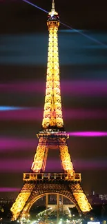 Eiffel Tower beautifully illuminated against a night sky, perfect for mobile wallpaper.