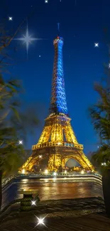 Illuminated Eiffel Tower against a starry night sky with lush green foliage.