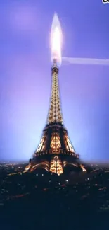 Eiffel Tower glowing at night in Paris cityscape wallpaper