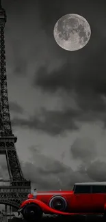 Eiffel Tower under moonlight with red vintage car.