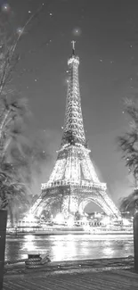 Black and white Eiffel Tower wallpaper with Parisian nightscape.