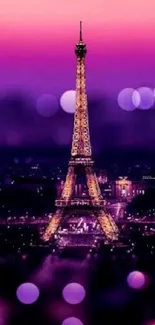 Eiffel Tower glowing in purple hues against a night sky.