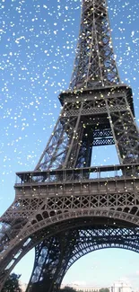 Eiffel Tower against a vibrant blue sky in Paris, offering a scenic view.