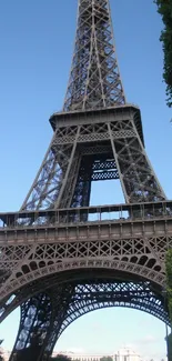 Eiffel Tower mobile wallpaper with clear blue sky.