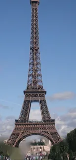 Eiffel Tower with clear blue sky background, perfect for mobile wallpaper.