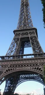 Eiffel Tower mobile wallpaper with clear blue sky.