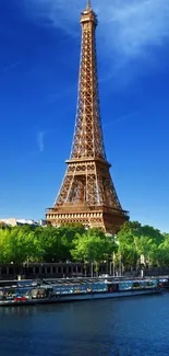 Mobile wallpaper of Eiffel Tower against a bright blue sky.