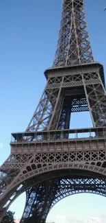 Eiffel Tower with clear blue sky, perfect for mobile wallpaper.