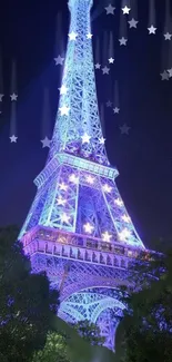 Eiffel Tower illuminated under a starry night.