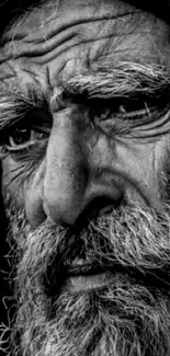 Black and white close-up portrait of an elderly man.