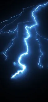 Electric blue lightning bolt on dark background.