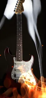 Electric guitar with lively flames and swirling smoke on a dark background.