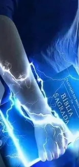 Person holding an electrified, glowing blue book with striking visual effects.