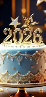 2026 celebration cake with gold stars and blue icing.
