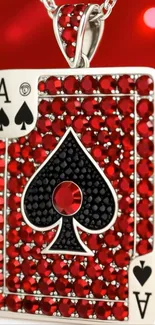 Ace of Spades pendant with red gemstones on a chain.