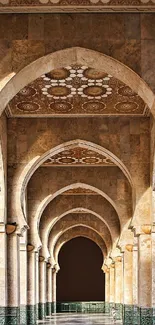Intricate arched corridor with elegant design and stone architecture.
