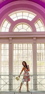 Elegant arched window with woman on balcony in vibrant hues.