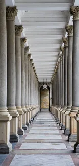 Symmetrical stone columns in an elegant corridor, mobile wallpaper.