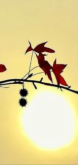 Red autumn leaves on branch against golden sunset in minimalist style.