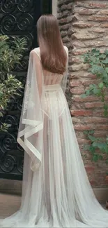 Elegant back view in a garden with flowing white gown.