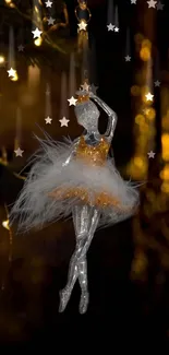 Elegant ballerina ornament with gold and bokeh lights on a mobile wallpaper.