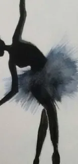 Ballerina silhouette in black tutu against light background.