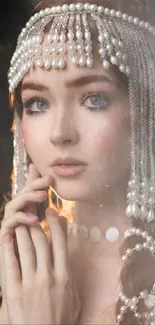 Woman with beaded headpiece and pearls in elegant portrait.