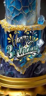 An elegant birthday cake with blue and gold accents.