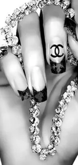 Black and white hand with luxury jewelry.