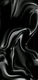 Elegant black abstract wallpaper with smooth, glossy swirls for mobile display.