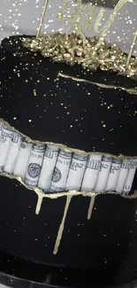 Black cake with gold accents and dollar bills on a marble surface.