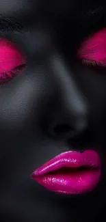 Matte black face with vivid pink makeup, striking elegance.