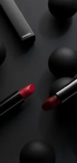 Black spheres with red lipstick wallpaper.