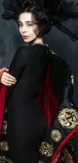 Elegant person cloaked in luxurious black and red with golden accents.