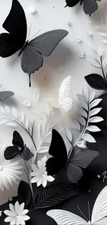 Black and white butterflies with flowers and leaves.