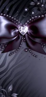 Elegant black bow with heart gem center on zebra pattern