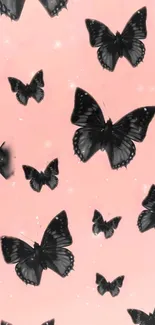 Black butterflies on a light pink background mobile wallpaper.