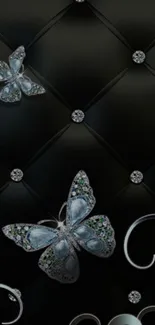 Elegant black wallpaper with jeweled butterflies.