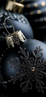 Elegant black Christmas ornament with silver accents.