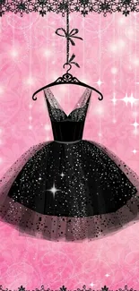 Elegant black dress on sparkling pink background.