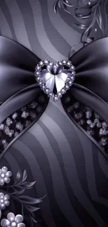 Elegant black wallpaper with floral bow and jeweled heart.